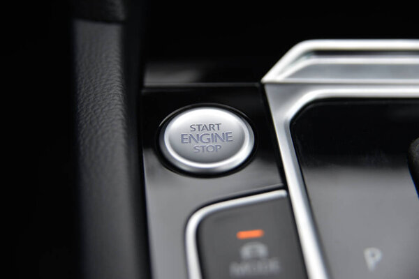 Close up of a car's push button start engine ignition system