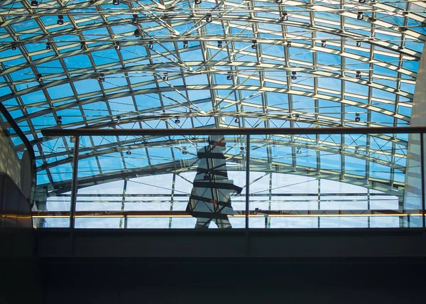 Man Walking Big Glass Steel Ceiling His Shadow Reflected Glass — Stock Photo, Image