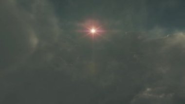 Bulutların üzerinde uç güneş ışığı