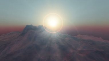 Gün batımında dağın üzerinden uç.