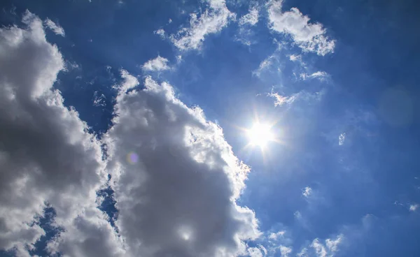 stock image natural clouds blue sky sun ray light