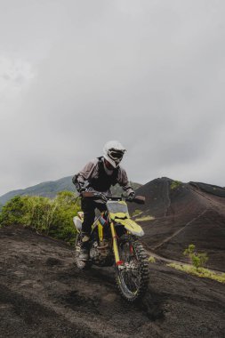 Enduro Adventure on Balis Mount Batur  Off-Road Motorbike Experience on Volcanic Trails clipart