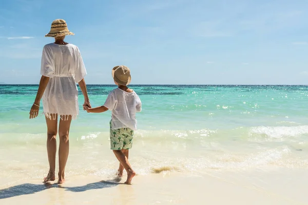 Tropical Photo Mom Son Having Fun Together Holding Hands Walking — Fotografia de Stock