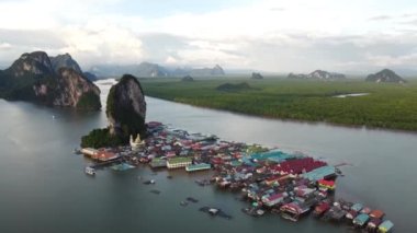 Amazing aerial view of floating fisherman village Ko Panyi in Thailand, Asia. Tropical drone landscape.