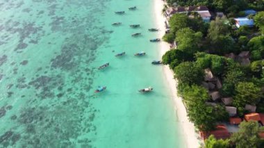 Amazing aerial view of the sandy beach in Koh Lipe island, Thailand, Asia. Tropical travel destination. Summer vibes.