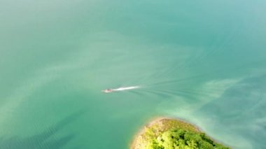Aerial drone view of long tail boat on the sea. Copy space. Thailand, Asia.