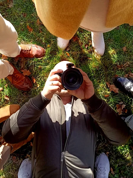 Man Making Photographs Camera While Lying Green Grass Park Interesting — Stock Photo, Image