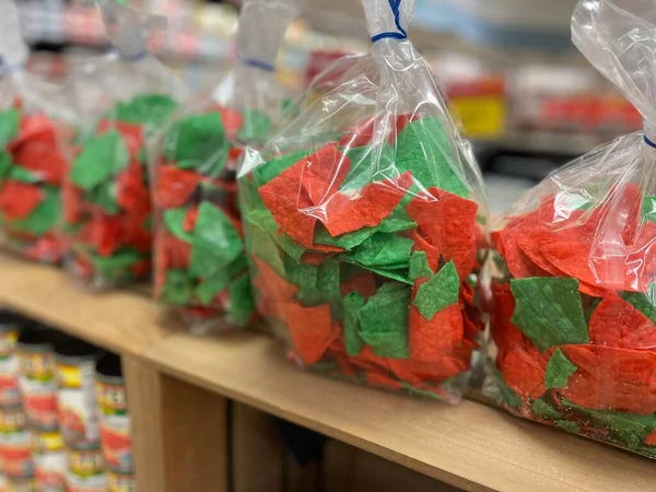 Grovetown, Ga USA - 11 02 22: Grocery store red and green tortilla chips in a bag