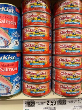 Grovetown, Ga USA - 01 02 23: Grocery store Chicken can skinless salmon stacked up