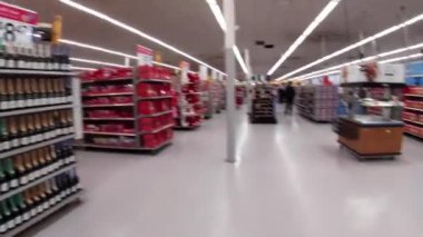 Martinez, Ga USA - 01 21 22: Walmart super center interior Valentines displays POV walking TV display