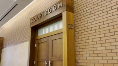 Augusta, Ga USA - 10 27 21: Richmond County courthouse interior courtroom door tilt with sound