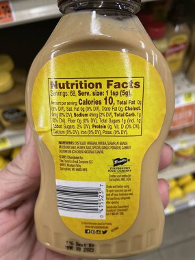 Hephzibah, Ga USA - 01 12 23: IGA Grocery store ingredients label Frenches honey mustard