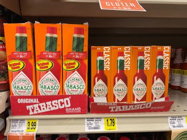 Hephzibah, Ga USA - 01 12 23: IGA Grocery store Tabasco hot sauce and shelf price