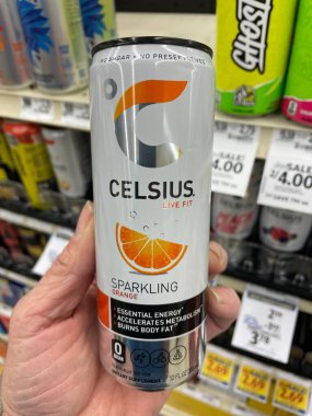 Grovetown, Ga USA - 01 13 23: Grocery store Hand holding Celsius energy drink