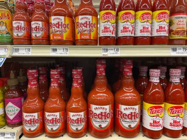 Grovetown, Ga USA - 01 13 23: Grocery store hot sauce prices on store shelf