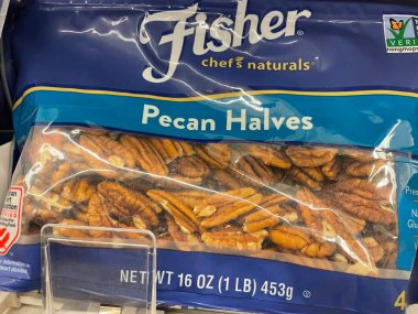 Grovetown, Ga USA - 09 03 22: Grocery store Fisher nuts in a bag pecan halves