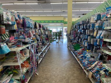 Augusta, Ga USA - 01 26 23: Dollar Tree retail store interior messy party aisle clipart