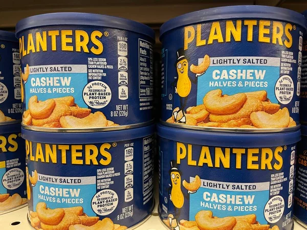 stock image Grovetown, Ga USA - 03 10 23: Grocery store Planters peanuts canisters lightly salted cashews