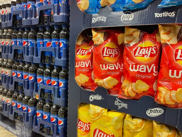 stock image Grovetown, Ga USA - 11 02 22: Grocery store Lays chips and pepsi cola display