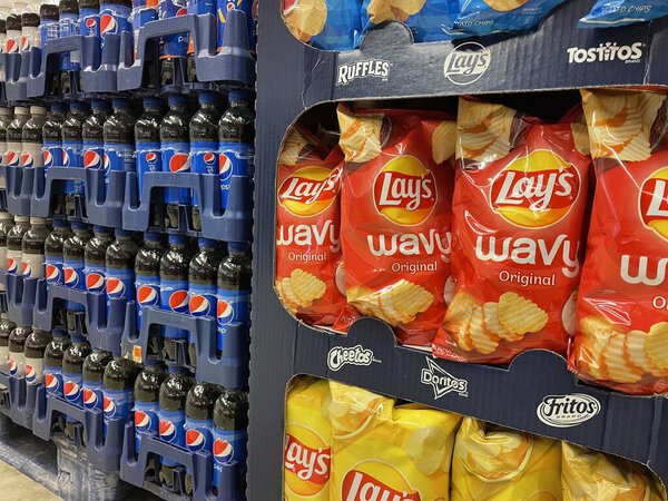Grovetown, Ga USA - 11 02 22: Grocery store Lays chips and pepsi cola display