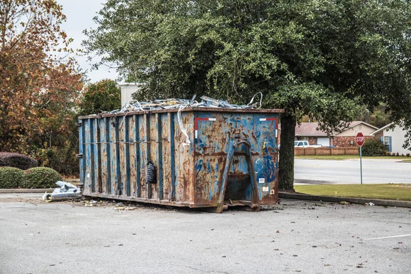 Overflowing Construction Dumpster Road Background — Stock Photo, Image