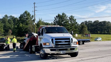 Augusta, Ga USA - 09 23 2021: Semi truck and pickup truck collision car wreck and Police officers on scene on Highway 1 clipart