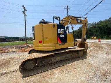 Blythe, Ga USA - 06: 18 23: Yol çalışması ağır makineler, toprak taşıyıcı yol yapımı Hwy 88