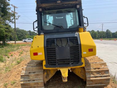 Blythe, Ga USA - 06: 18 23: Yol çalışması ağır makineler, toprak taşıyıcı yol yapımı Hwy 88