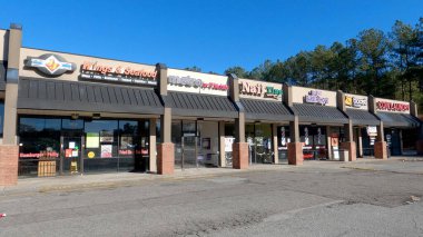 Augusta, Ga USA - 12: 25 Noel Günü perakende satış mağazaları açık mavi gökyüzü