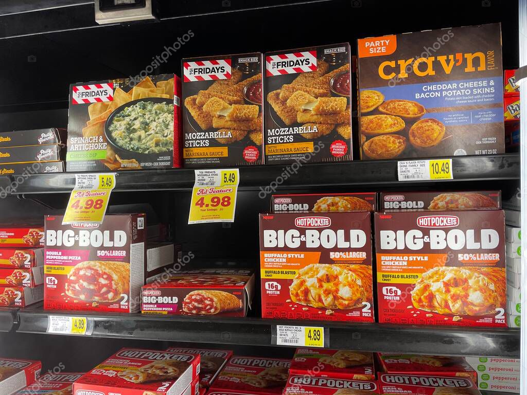 Hephzibah, Ga USA - 06 16 23: IGA Grocery store frozen dinners Hot Pockets Big and bold