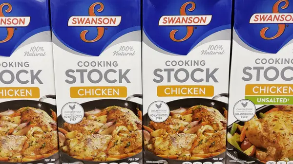 Stock image Grovetown, Ga USA - 02 16 22: Grocery store Swanson cooking chicken broth cartons