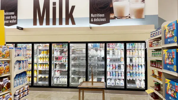 stock image Grovetown, Ga USA - 12 28 2022: Food Lion grocery store 2021 holidays milk coolers and wall decor