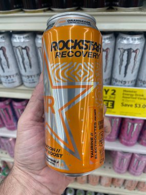 Lakeland Fla, USA - 05 19 24: Harveys grocery store interior Rockstar energy drink recovery clipart