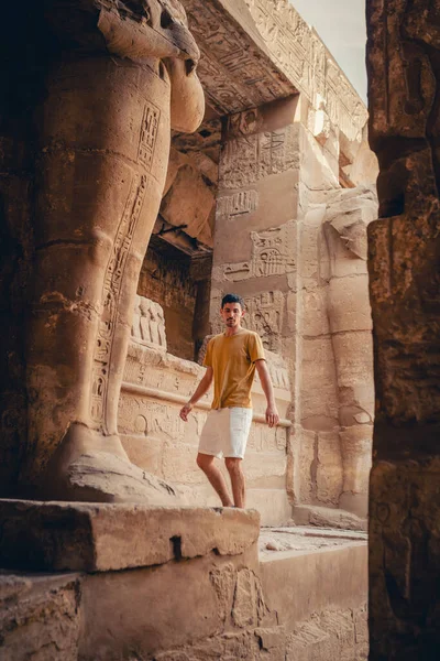 stock image young male traveler visits Karnak temple in Luxor, Egypt