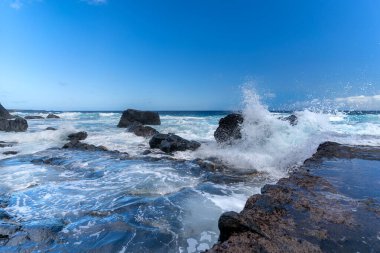 Seascape. waves beating against the rocks in El Golfo. Sabinosa. El Hierro island. Canary islands clipart