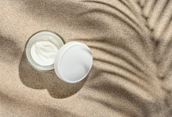 Opened Cream Jar White Lid Beige Sand Top View Packaging — Stock Photo, Image