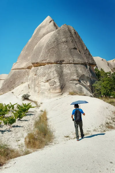 Man Umbrella Walking Unique Geological Formations Cappadocia Blue Sky Summer — Stock Photo, Image