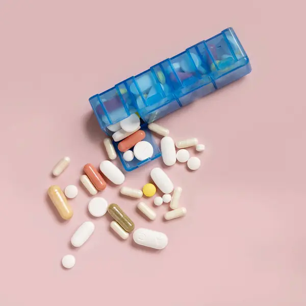 Mix Medical Capsules Pills Blue Weekly Organizer Light Pink Top — Stock Photo, Image