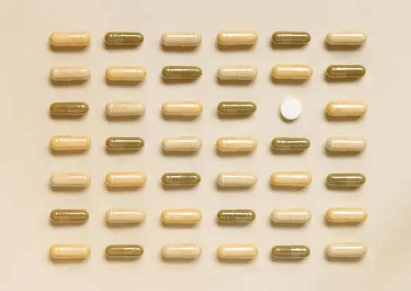 Mix Medical Capsules Onewhite Pill Lines Light Beige Top View — Stock Photo, Image