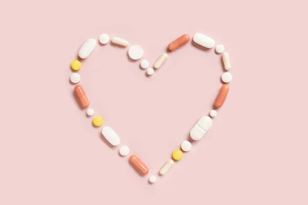 Heart Shape Made Colorful Drug Pills Capsules Light Pink Top — Stock Photo, Image