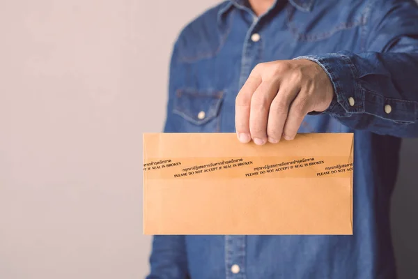 Businessman Holding Brown Confidential Envelope Sealed Tape Word Please Accept — Stock Photo, Image