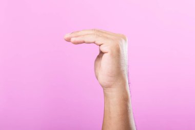 Hand displays various gestures, including a fist, open palm, and raised fingers, against a pink background. A visual exploration of communication through hand symbols clipart