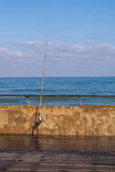 Fishing Rod Leaning Wooden Railing Port Area Tel Aviv Israel — Stock Photo, Image