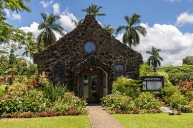 Kilauea, Kauai, Hawaii 17 Haziran 2023 Christ Memorial Episcopal Kilisesi, Kilauea, Hawaii, ABD. Lav taşlarından yapılmış küçük şirin bir kilise.. 