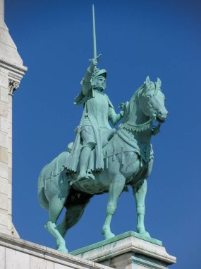 Paris Fance, 09/26/2009 Basilica of the Sacr'e Coeur's bronze equestrian statue of Joan of Arc in the Montmartre area of Paris, France. 