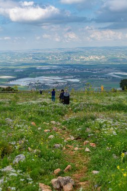 Mount Gilboa, Israel March 08, 2024 People enjoying the view of the Harod Valley and Jezreel Valley from the Gilboa Mountain range in Israel. clipart