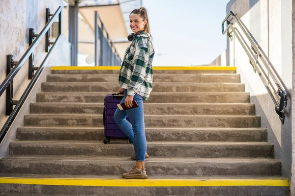 Happy Woman Suitcase Ticket Standing Stairs Train Station — Fotografia de Stock