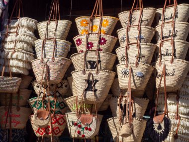 Moroccan artisan bags exposed in the street of a shop in Marrakech Morocco