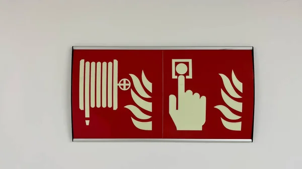 Illustration of signaling warning of use of anti fire hose and anti fire alarm button