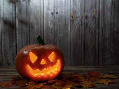 Cadılar Bayramı balkabağı başlıklı fener mumlu bir balkabağı ahşap arka planda